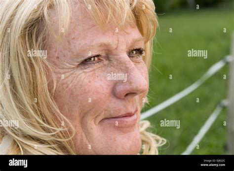 Satisfied Mature Woman On Green Stock Photo Alamy