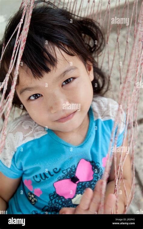 Happy little Girl, Laos Stock Photo - Alamy