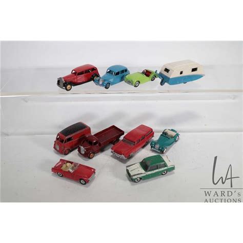 Ten vintage Dinky Toys die-cast cars, trucks plus an R.V.