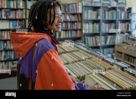 Woman Seen Searching Through Vinyl Records Stock Photo Alamy