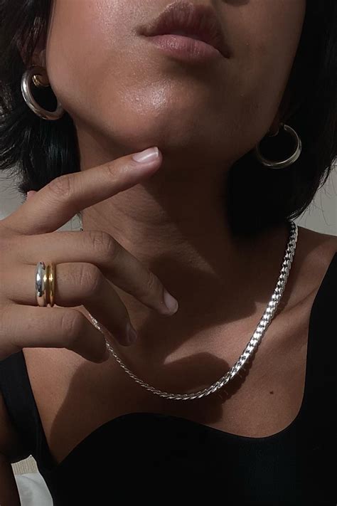 How To Pull Off Mixing Gold And Silver Jewelry Who What Wear