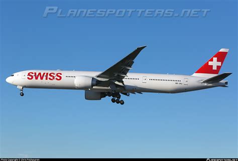 HB JNJ Swiss Boeing 777 3DEER Photo By Chris Pitchacaren ID 1048875