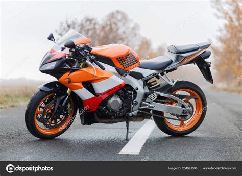 Orange Honda Motorcycle