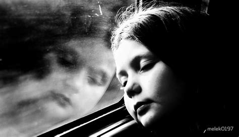 "Child's reflection in train window" by melek0197 | Redbubble