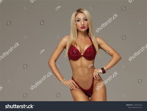 Sexy Athletic Woman Red Bikini Showing Stock Photo 1103447546 Shutterstock