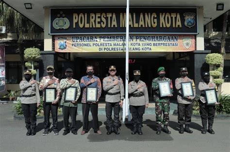 Polresta Malang Kota Gelar Upacara Pemberian Penghargaan Dan Bpjs