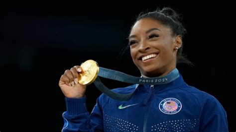 Simone Biles captures seventh Olympic gold by winning vault for second time