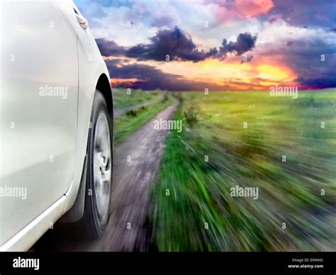 View of the front of a car while driving fast Stock Photo - Alamy