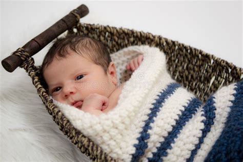 Baby Boy In A Wicker Basket Stock Image Image Of Life Blanket 26106195