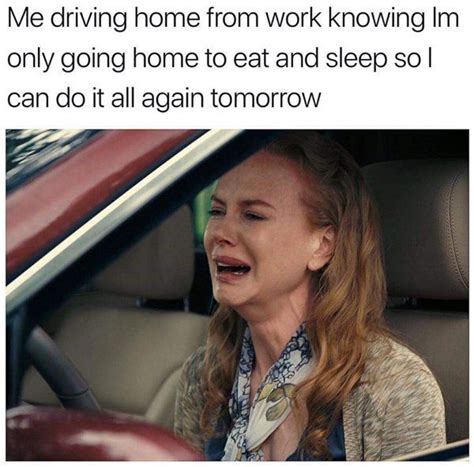 A Woman Sitting In The Drivers Seat Of A Car With Her Mouth Open