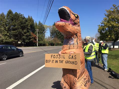 Group Protests Against Use Of Fossil Fuels And Fracking Outside Of