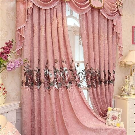 Pink Curtains With Flowers On Them In Front Of A Window