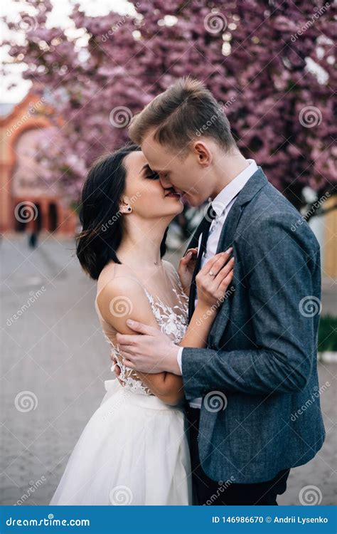 Bride And Groom Tender Hugs On Their Wedding Day Stock Photo Image Of