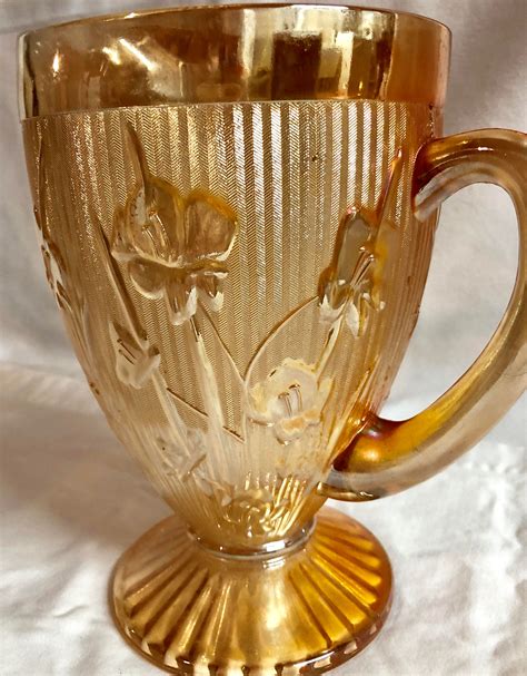 Antique Iris And Herringbone Marigold Carnival Glass Pitcher