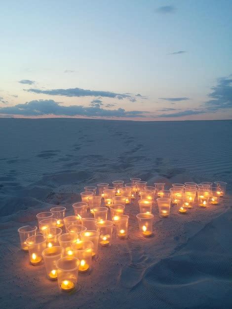 Premium Photo | A romantic evening in a deserted place Candles on the ...