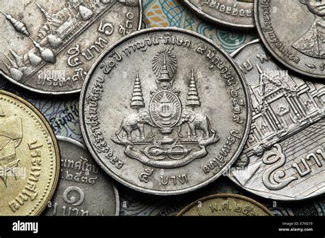 Coins of Thailand. The Royal Golden Jubilee Emblem depicted in the old ...
