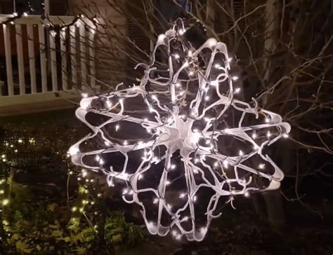 How To Make A DIY Light Up Snowflake Using Dollar Tree Hangers Vinyl