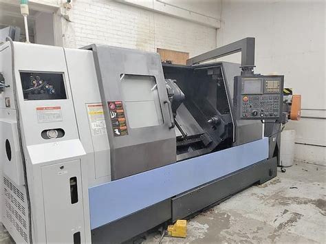 Daewoo Doosan Fanuc 21i TB 1500 RPM Puma 400C CNC Turning Center 2 Axis