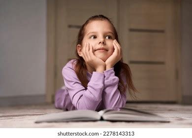 Cute Girl Lying On Floor Reading Stock Photo 2278143313 | Shutterstock