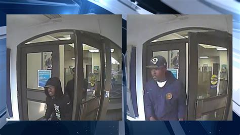 Police Searching For Two Suspects In Armed Bank Robbery