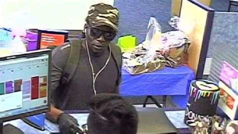 Report Photos Of Bank Robbery Suspect Released To Help Police Case