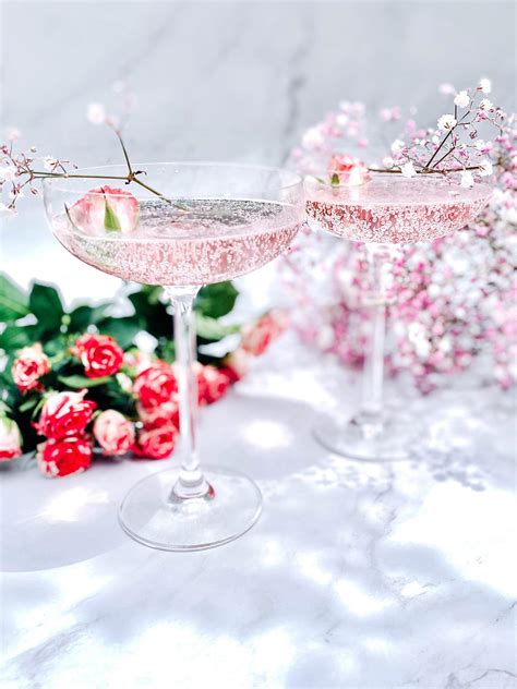 Glasses of Champagne with Floral Decorations · Free Stock Photo