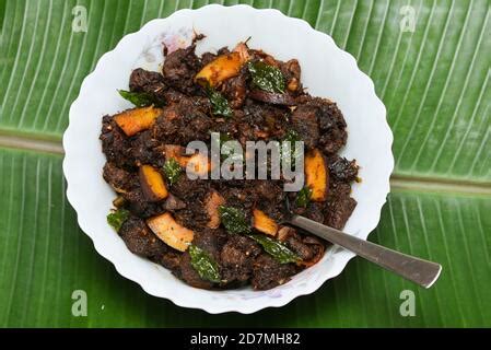 Kerala beef with parotta porotta roti. beef fry beef curry kerala style ...