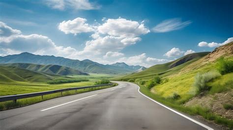 Premium Photo An Open Road Stretching Through Scenic Landscapes