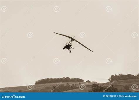 Flying Microlight Aircraft Sepia Stock Image - Image of microlight ...