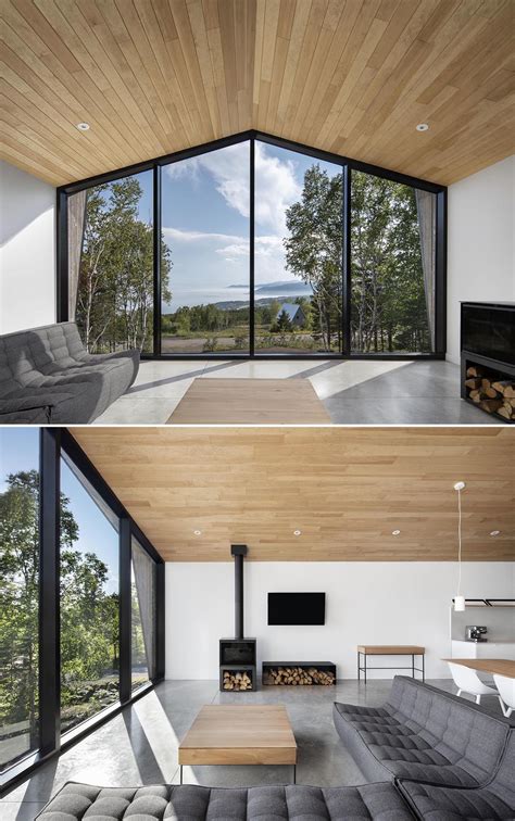 A Full Wall Of Windows At One End Of The Living Room Of This Home Allow
