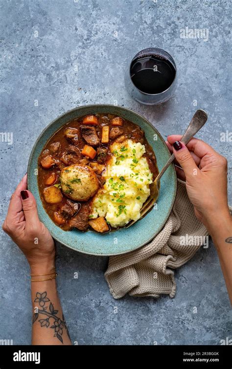 Slow cooker beef stew with dumplings Stock Photo - Alamy