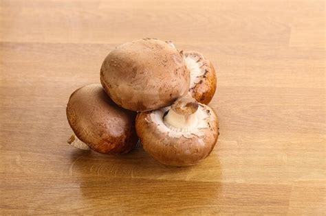 Premium Photo Raw Brown Champignons Mushroom Heap