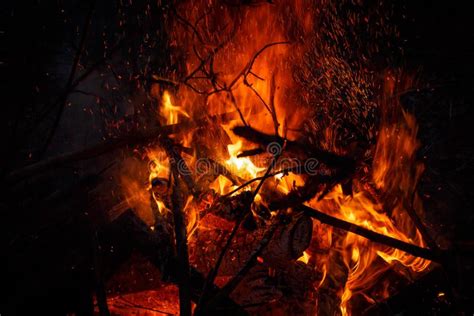 Campfire Flame With Sparks Flying Up Stock Photo Image Of Bonfire