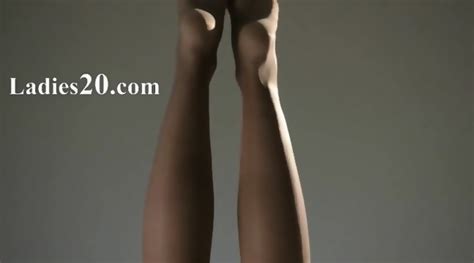 Pleasing Babe In Nylon Jerking Off Strapon