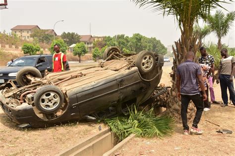 Photos Driver 4 Passengers Escape Death As Car Somersaults In Abuja