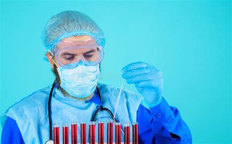 Blood Test Lab Technician Working With Patient Blood Sample Detection