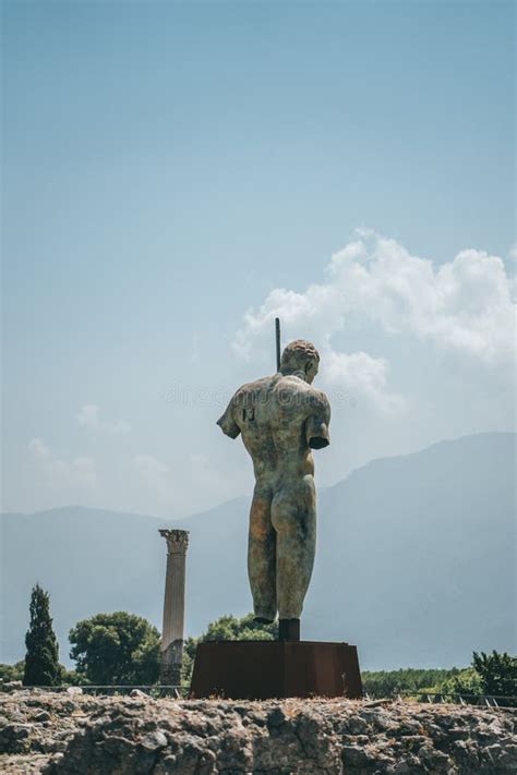 Naked Man Statue In Pompei Archaelogical Ruins During Summer Time Stock