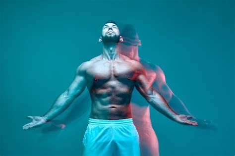 Premium Photo Confident Athletic Man With Muscular Naked Torso Feels Power Looks Up In