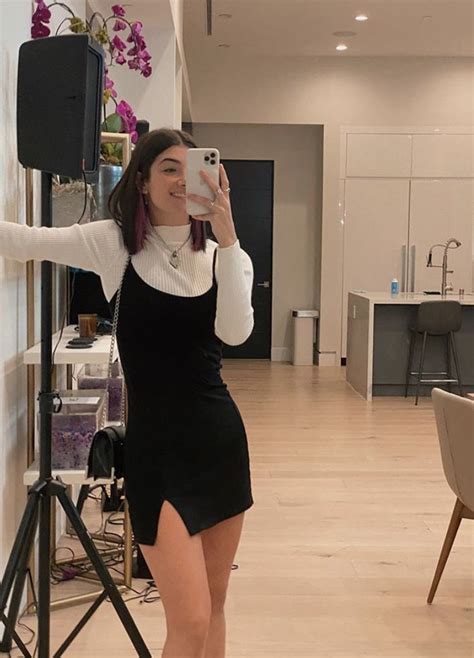 Charli Damelio In White Longsleeve Turtleneck With Black Fitted Dress