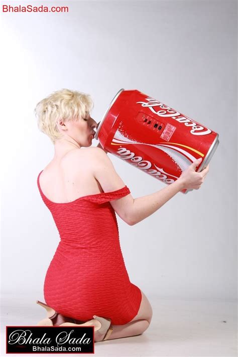 Smoking Hot Blonde Girl Loves Posing With A Big Coke Can 15 Photos