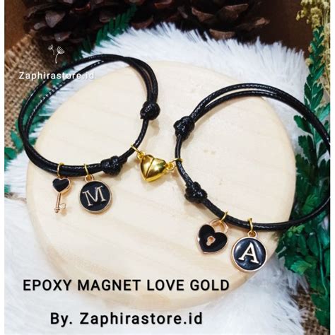 Jual Zaphira TERBARU GELANG COUPLE EPOXY MAGNET BENTUK LOVE Warna