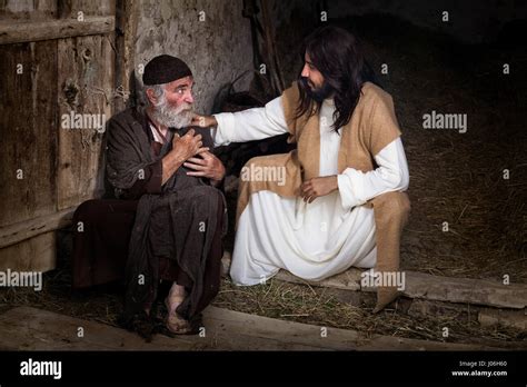 Jesus Healing The Lame Or Crippled Man Stock Photo Alamy