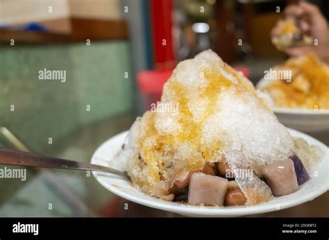 Eating Shaved Ice With Colorful Dessert Stock Photo Alamy