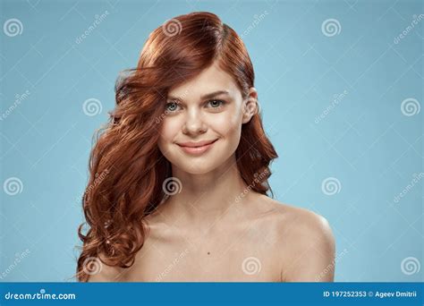 Beautiful Woman Curly Long Hair Smooth Hairstyle Naked Shoulders Cosmetics Care Blue Background