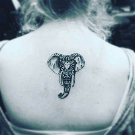 Elephant tattoo on back black and white Elephant Tattoo Design ...