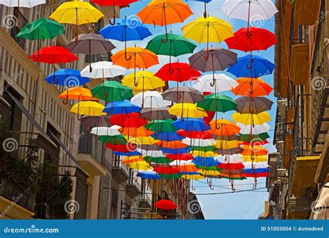 Colorful Umbrellas Installed On The Street In Spanish City. Stock Photo ...