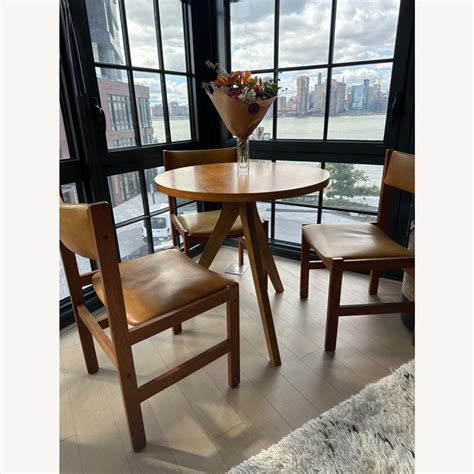 West Elm Tripod Dining Table Walnut AptDeco