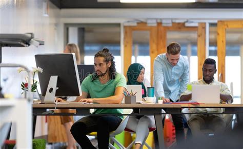 Business People Working at Desk in a Modern Office Stock Photo - Image ...