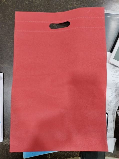 Pp Red Plain Non Woven D Cut Bag At Rs 90 Kg In Bhiwani Id 2849783571388