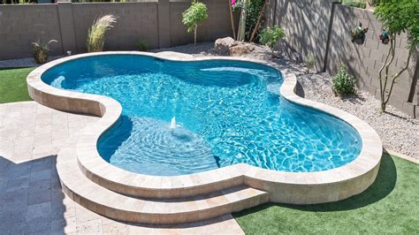 Small Backyard Pool Design Ideas: Raised Freeform Fun